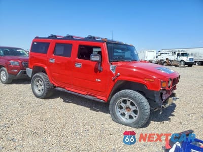 Czwarte zdjęcie samochodu z boku: 2007 HUMMER H2 VIN:5GRGN23U47H108111 - miniatura