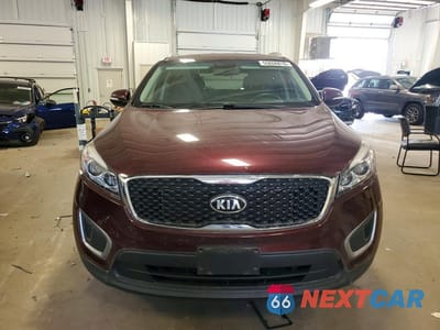 Piąte zdjęcie samochodu w środku: 2016 KIA SORENTO LX VIN:5XYPG4A32GG183271 - miniatura