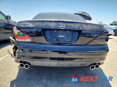 Zdjęcie 6 z 12 samochodu: 2005 MERCEDES-BENZ SL 500 VIN:WDBSK75F25F099299 - miniatura