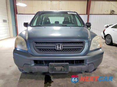 Piąte zdjęcie samochodu w środku: 2005 HONDA PILOT LX VIN:2HKYF18195H512726 - miniatura