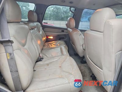 Zdjęcie 11 z 14 samochodu: 2002 GMC YUKON VIN:1GKEC13Z12J235540 - miniatura