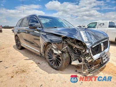 Czwarte zdjęcie samochodu z boku: 2021 LINCOLN AVIATOR RESERVE VIN:5LM5J7WC0MGL18753 - miniatura