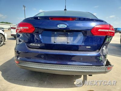 Zdjęcie 6 z 12 samochodu: 2017 FORD FOCUS SEL VIN:1FADP3H28HL283767 - miniatura