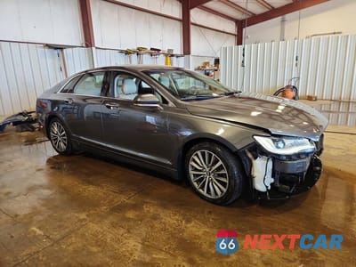 Czwarte zdjęcie samochodu z boku: 2017 LINCOLN MKZ SELECT VIN:3LN6L5DC8HR624428 - miniatura
