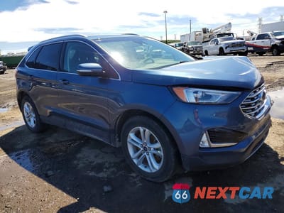 Czwarte zdjęcie samochodu z boku: 2019 FORD EDGE SEL VIN:2FMPK4J9XKBB60929 - miniatura