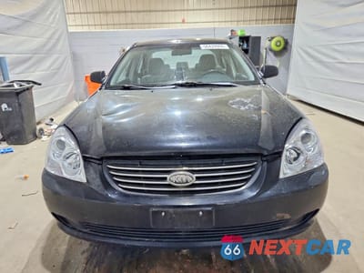 Piąte zdjęcie samochodu w środku: 2007 KIA OPTIMA LX VIN:KNAGE123X75110657 - miniatura