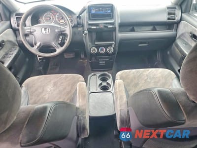 Zdjęcie 8 z 13 samochodu: 2004 HONDA CR-V EX VIN:SHSRD788X4U258623 - miniatura