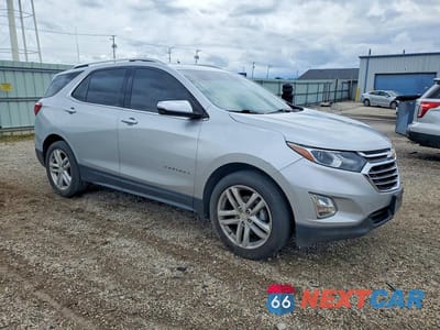 Czwarte zdjęcie samochodu z boku: 2018 CHEVROLET EQUINOX PREMIER VIN:3GNAXVEV6JS511022 - miniatura