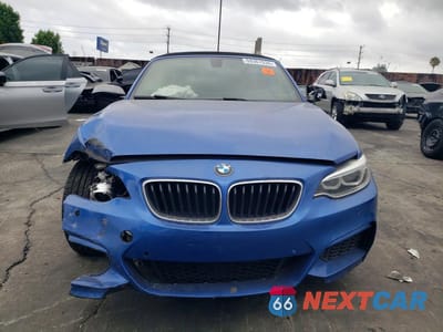 Piąte zdjęcie samochodu w środku: 2015 BMW M235I VIN:WBA1M1C58FV393521 - miniatura