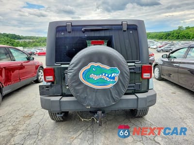 Zdjęcie 6 z 12 samochodu: 2011 JEEP WRANGLER UNLIMITED SPORT VIN:1J4BA3H15BL510781 - miniatura