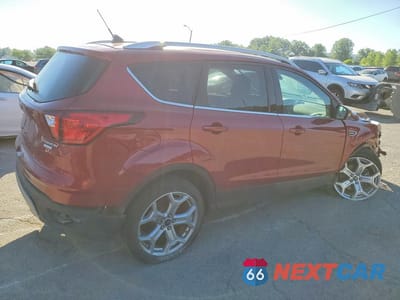 Trzecie zdjęcie samochodu z tyłu: 2019 FORD ESCAPE TITANIUM VIN:1FMCU0J98KUA69413 - miniatura