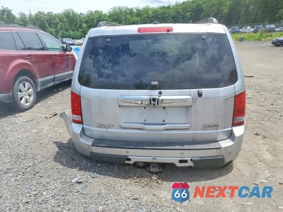 Zdjęcie 6 z 13 samochodu: 2011 HONDA PILOT TOURING VIN:5FNYF4H98BB041587 - miniatura