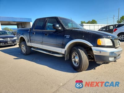 Czwarte zdjęcie samochodu z boku: 2001 FORD F150 SUPERCREW VIN:1FTRW08WX1KF89773 - miniatura