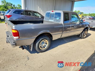 Trzecie zdjęcie samochodu z tyłu: 1999 FORD RANGER SUPER CAB VIN:1FTYR14V4XTA93702 - miniatura