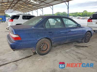 Trzecie zdjęcie samochodu z tyłu: 1997 TOYOTA COROLLA DX VIN:2T1BB02E6VC185258 - miniatura