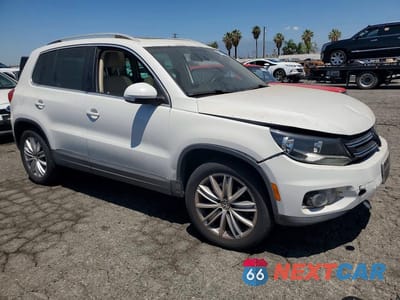Czwarte zdjęcie samochodu z boku: 2012 VOLKSWAGEN TIGUAN S VIN:WVGAV7AX8CW530532 - miniatura