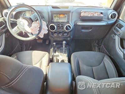 Zdjęcie 8 z 12 samochodu: 2016 JEEP WRANGLER UNLIMITED SAHARA VIN:1C4BJWEG2GL208145 - miniatura