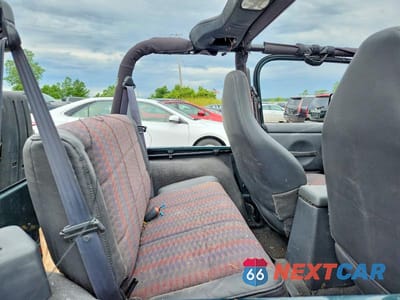 Zdjęcie 11 z 14 samochodu: 2000 JEEP WRANGLER / TJ VIN:1J4FA49S4YP787048 - miniatura