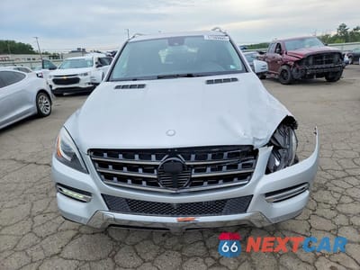 Piąte zdjęcie samochodu w środku: 2015 MERCEDES-BENZ ML 250 BLUETEC VIN:4JGDA0EBXFA464937 - miniatura