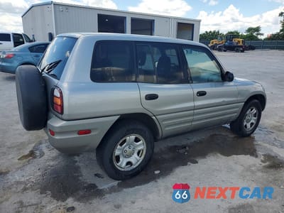 Trzecie zdjęcie samochodu z tyłu: 2000 TOYOTA RAV4 BASE VIN:JT3HP10V2Y0243163 - miniatura