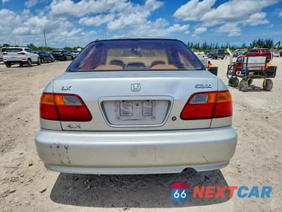 Zdjęcie 6 z 12 samochodu: 1999 HONDA CIVIC LX VIN:1HGEJ6670XL015490 - miniatura