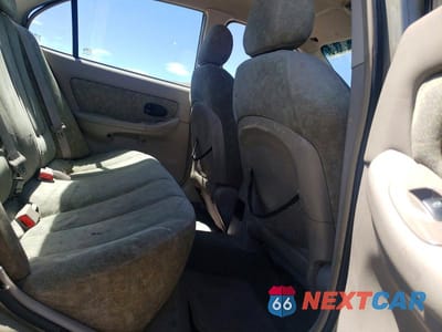 Zdjęcie 10 z 12 samochodu: 2001 HYUNDAI ELANTRA GLS VIN:KMHDN45D81U091224 - miniatura