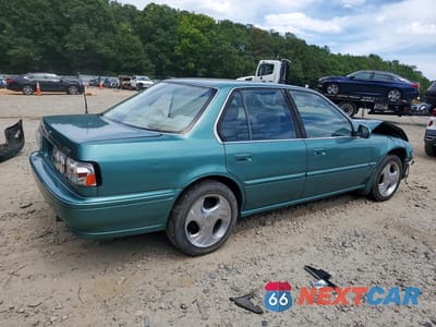 Trzecie zdjęcie samochodu z tyłu: 1993 HONDA ACCORD LX VIN:1HGCB7659PA002418 - miniatura