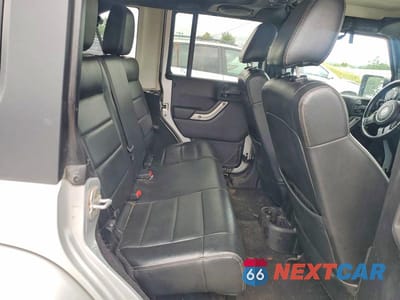 Zdjęcie 11 z 13 samochodu: 2012 JEEP WRANGLER UNLIMITED SAHARA VIN:1C4BJWEG7CL150012 - miniatura