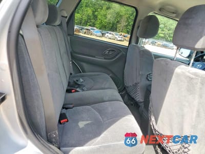 Zdjęcie 11 z 13 samochodu: 2003 MAZDA TRIBUTE LX VIN:4F2YZ94143KM11202 - miniatura