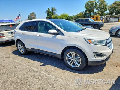 Czwarte zdjęcie samochodu z boku: 2015 FORD EDGE SEL VIN:2FMPK3J83FBB16150 - miniatura