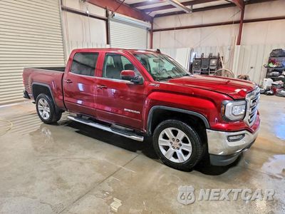 Czwarte zdjęcie samochodu z boku: 2017 GMC SIERRA K1500 SLE VIN:3GTU2MEC5HG423153 - miniatura