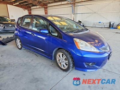 Czwarte zdjęcie samochodu z boku: 2011 HONDA FIT SPORT VIN:JHMGE8H55BC020744 - miniatura
