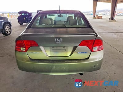 Zdjęcie 6 z 12 samochodu: 2006 HONDA CIVIC HYBRID VIN:JHMFA36206S028801 - miniatura