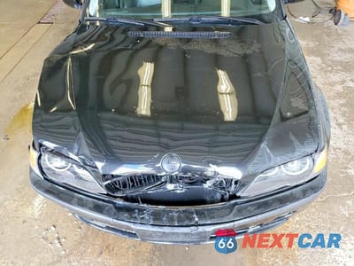 Zdjęcie 11 z 12 samochodu: 2004 BMW 330 I VIN:WBAEV53424KM33748 - miniatura