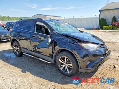 Czwarte zdjęcie samochodu z boku: 2018 TOYOTA RAV4 XLE VIN:2T3RFREV0JW804732 - miniatura