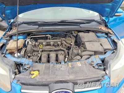 Zdjęcie 11 z 12 samochodu: 2014 FORD FOCUS TITANIUM VIN:1FADP3J26EL349528 - miniatura