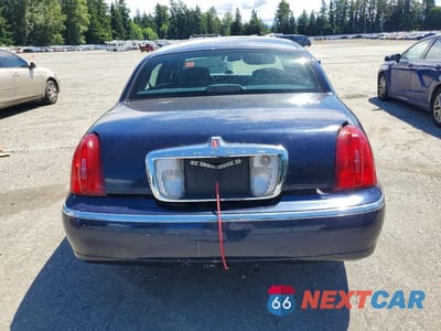 Zdjęcie 6 z 12 samochodu: 2001 LINCOLN TOWN CAR SIGNATURE VIN:1LNHM82W51Y612622 - miniatura
