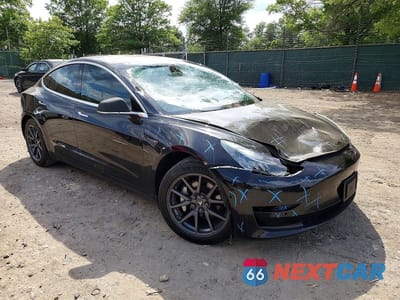 Czwarte zdjęcie samochodu z boku: 2018 TESLA MODEL 3 VIN:5YJ3E1EA1JF089134 - miniatura