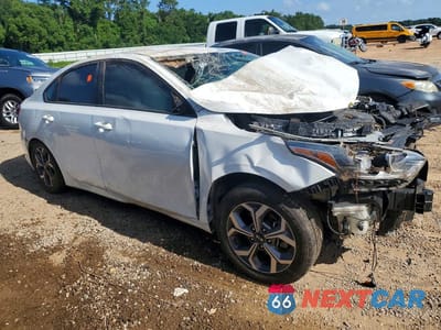 Czwarte zdjęcie samochodu z boku: 2019 KIA FORTE LXS VIN:3KPF24AD9KE112920 - miniatura