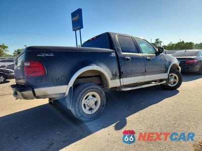 Trzecie zdjęcie samochodu z tyłu: 2001 FORD F150 SUPERCREW VIN:1FTRW08WX1KF89773 - miniatura