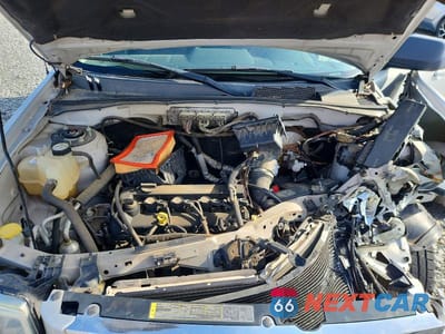 Zdjęcie 12 z 13 samochodu: 2009 MAZDA TRIBUTE VIN:4F2CZ02709KM06262 - miniatura