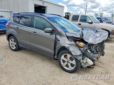 Czwarte zdjęcie samochodu z boku: 2014 FORD ESCAPE SE VIN:1FMCU9G94EUB06179 - miniatura