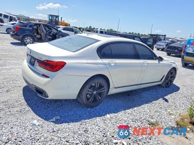 Trzecie zdjęcie samochodu z tyłu: 2018 BMW 740 I VIN:WBA7E2C53JG741932 - miniatura