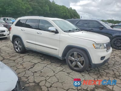 Czwarte zdjęcie samochodu z boku: 2011 JEEP GRAND CHEROKEE OVERLAND VIN:1J4RR6GT0BC714075 - miniatura