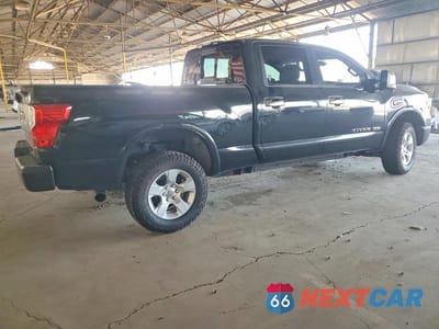 Trzecie zdjęcie samochodu z tyłu: 2017 NISSAN TITAN XD PLATINUM RESERVE VIN:1N6BA1F47HN564228 - miniatura
