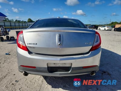 Zdjęcie 6 z 13 samochodu: 2013 LINCOLN MKS VIN:1LNHL9DK4DG613130 - miniatura
