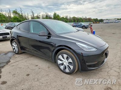 Czwarte zdjęcie samochodu z boku: 2023 TESLA MODEL Y VIN:7SAYGDEE0PA181199 - miniatura