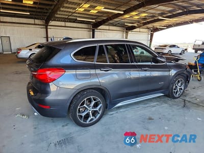 Trzecie zdjęcie samochodu z tyłu: 2018 BMW X1 VIN:WBXHT3C37J5F91908 - miniatura