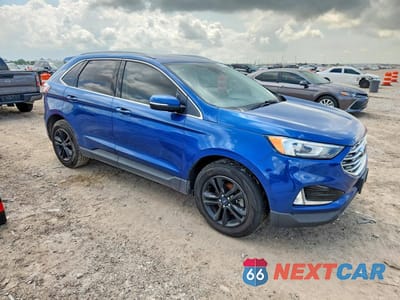 Czwarte zdjęcie samochodu z boku: 2020 FORD EDGE SEL VIN:2FMPK3J98LBA10796 - miniatura