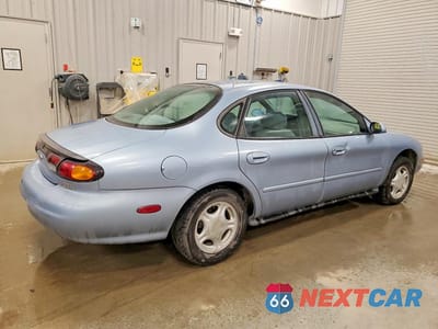 Trzecie zdjęcie samochodu z tyłu: 1997 FORD TAURUS GL VIN:1FALP52U3VG315384 - miniatura